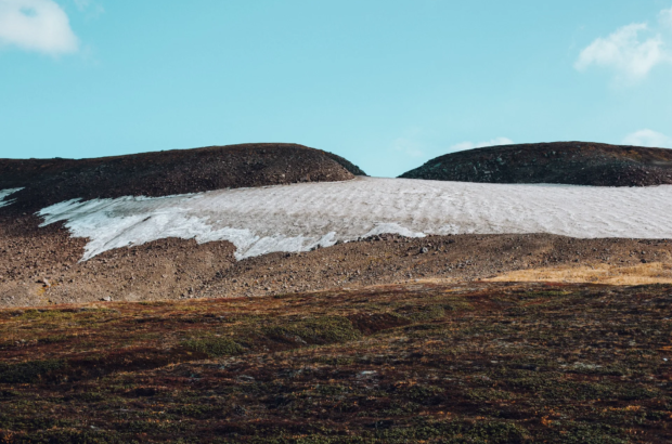 Photo by ROMAN ODINTSOV: https://www.pexels.com/photo/desert-valley-with-band-of-snow-on-top-4555677/