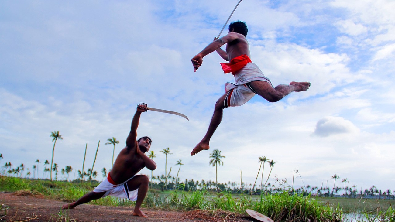 Kalaripayattu_mock_combat_in_rural_Kerala