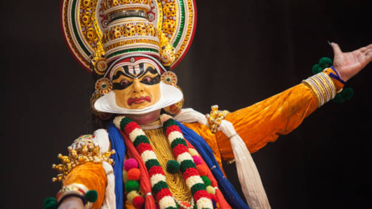 Kathakali artist rare subhramanya pose with yellow face paint