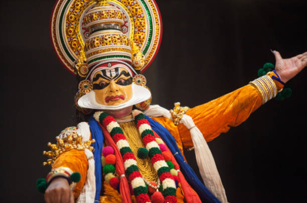 Kathakali artist rare subhramanya pose with yellow face paint